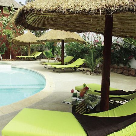 Hotel Le Lion Dort Somone Exterior foto