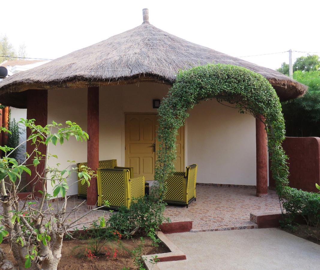 Hotel Le Lion Dort Somone Exterior foto