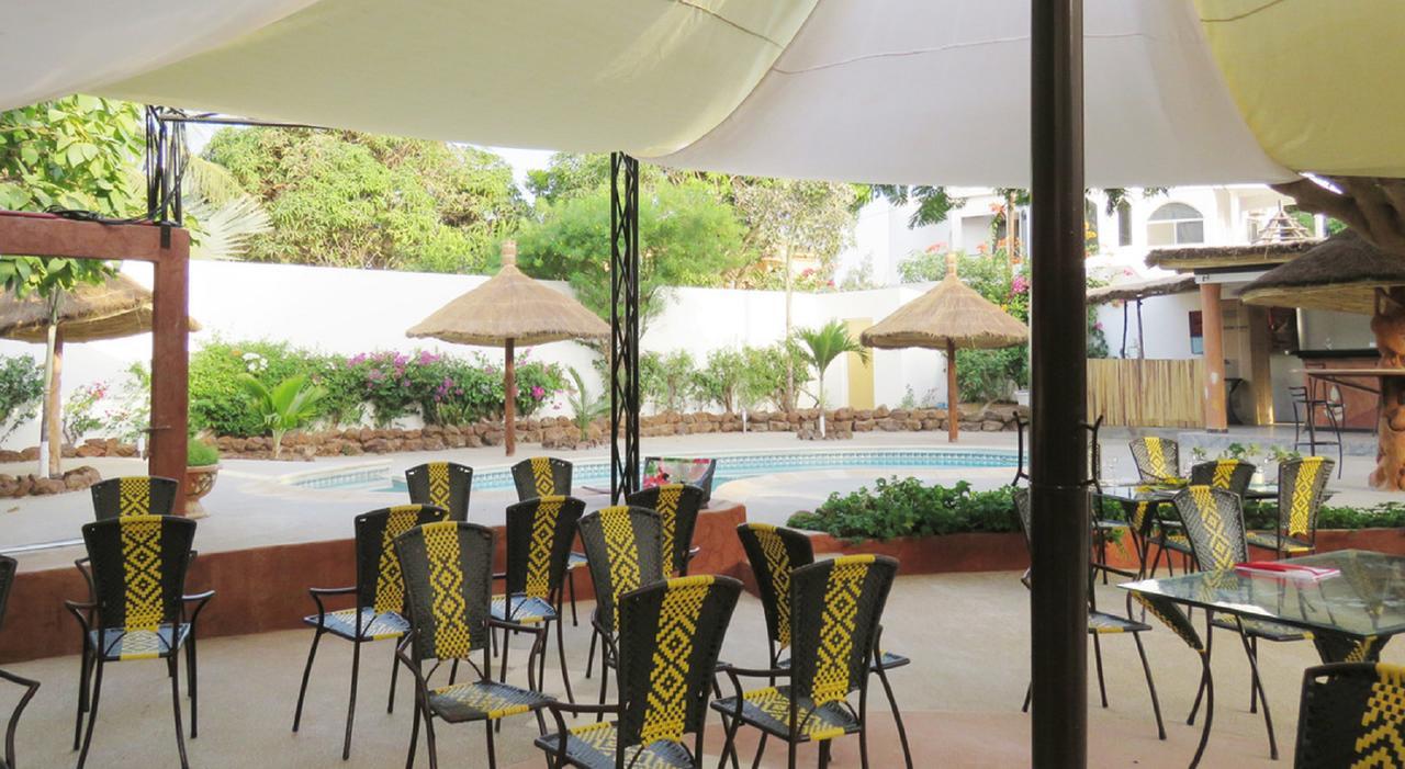 Hotel Le Lion Dort Somone Exterior foto